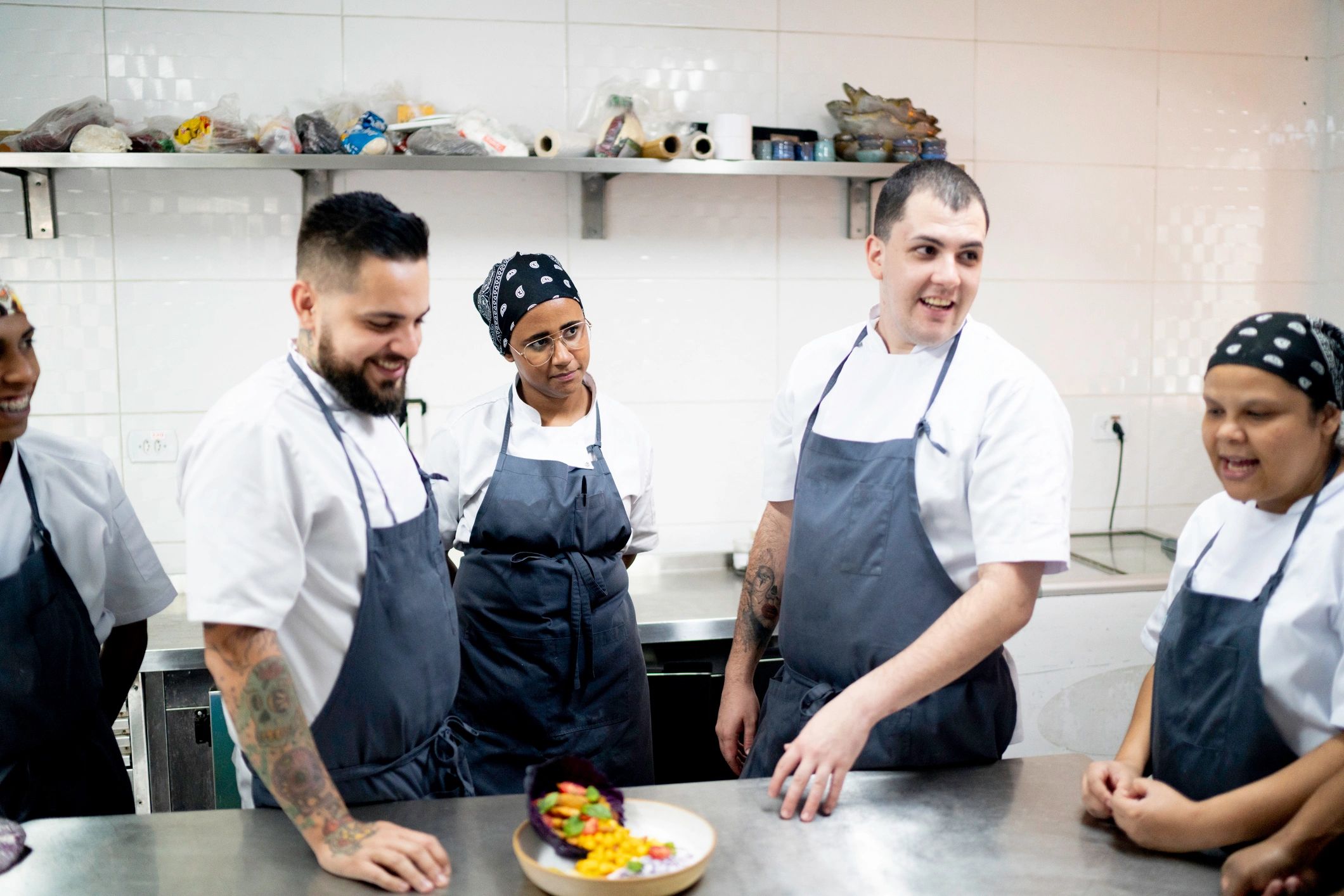 Chapter members meeting in a professional kitchen